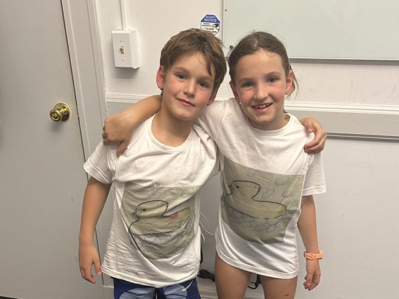 Pothier SIblings wearing their band shirts
